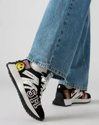 Campo Nero con toppe multicolori