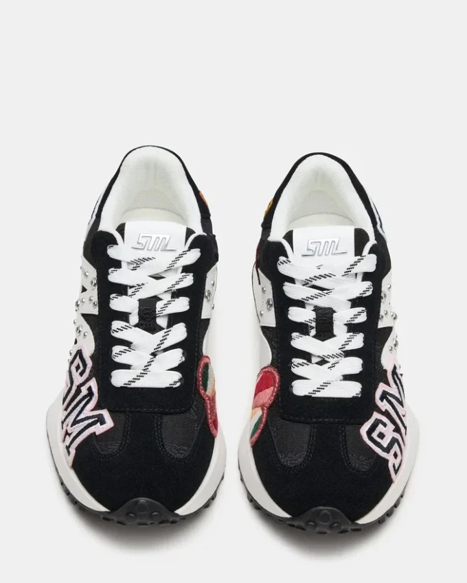 Campo Nero con toppe multicolori Campo Nero con toppe multicolori