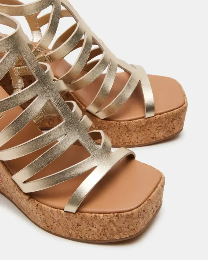 Cozette in pelle dorata