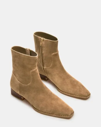 Define in pelle scamosciata color tortora