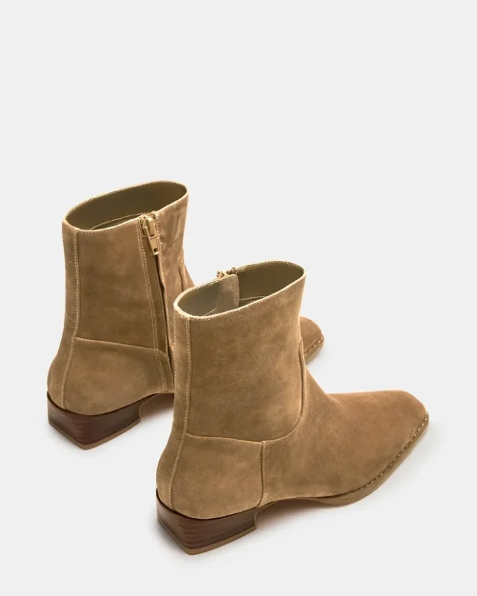 Define in pelle scamosciata color tortora