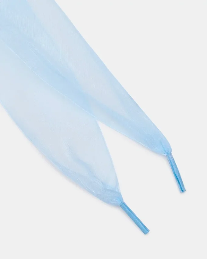 Lacci per scarpe e ciondoli blu