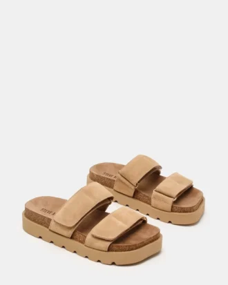 Luther in pelle scamosciata color tortora